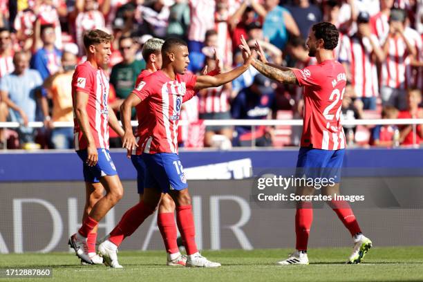 Samuel Lino of Atletico Madrid celebrates 1-0 with Antoine Griezmann of Atletico Madrid Mario Hermoso of Atletico Madrid during the LaLiga EA Sports...