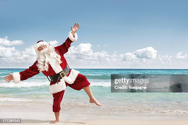 santa in vacations - christmas summer stockfoto's en -beelden