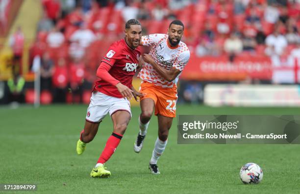 Charlton Athletic's Terell Thomas and Blackpool's CJ Hamilton during the Sky Bet League One match between Charlton Athletic and Blackpool at Oakwood...