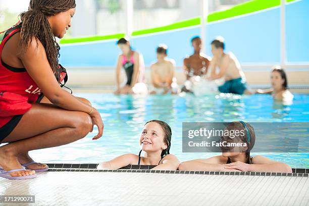 swimming lessons - life guard stock pictures, royalty-free photos & images