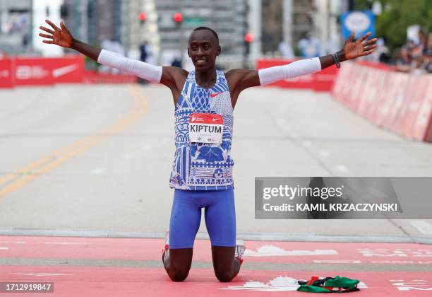 Kenya's Kelvin Kiptum celebrates winning the 2023 Bank of America Chicago Marathon in Chicago, Illinois, in a world record time of two hours and 35...