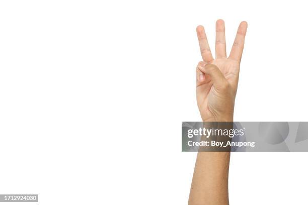 cropped shot of men's hand showing three fingers isolated with white background. - 3 fingers stock-fotos und bilder