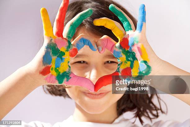 painted hands sign heart - craft stock pictures, royalty-free photos & images