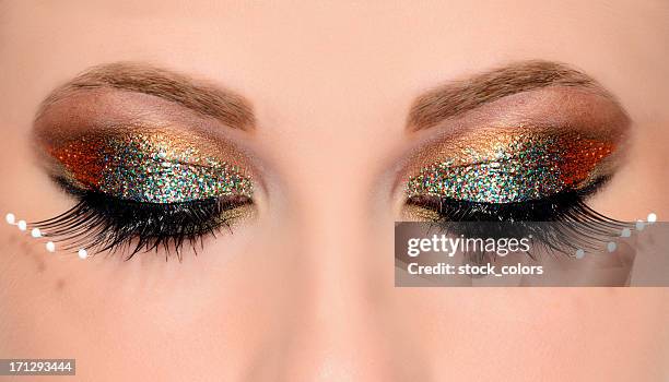 glitter maquiagem - gold eyeshadow imagens e fotografias de stock