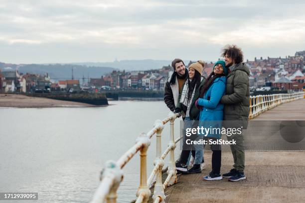 taking in the views of whitby - double date stock pictures, royalty-free photos & images