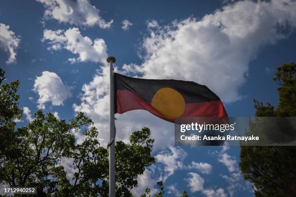 An Aboriginal flag flys at an early learning centre on October 02, 2023 in Melbourne, Australia. On October 14 Australians will vote on a referendum...