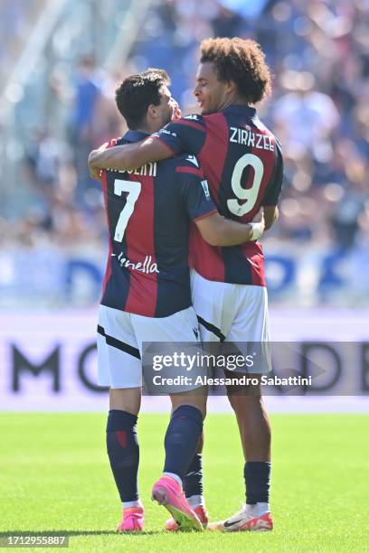 Riccardo Orsolini of Bologna FC celebrates after scoring his team second goal with Joshua Zirkzee of Bologna FC during the Serie A TIM match between...