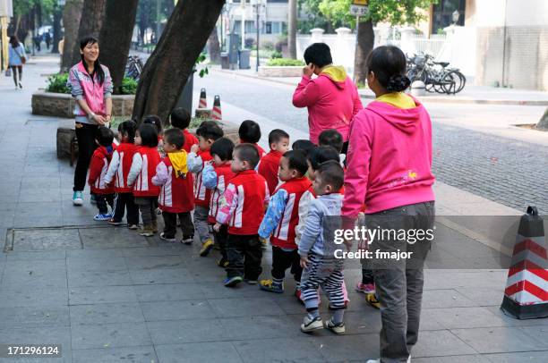 chinese nursery school childrens - kids lining up stock pictures, royalty-free photos & images