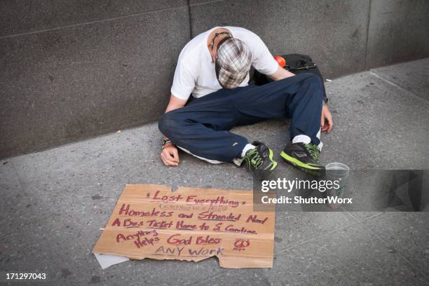 homeless in new york - man sleeping with cap stock pictures, royalty-free photos & images