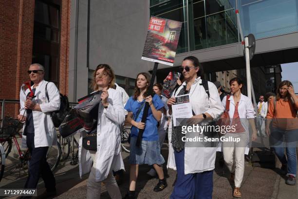 Striking medical physicians march to protest against working conditions and the health sector reform proposals of the federal government on October...