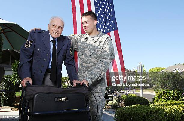 grandfather and grandson soldiers - military army ranks stock pictures, royalty-free photos & images