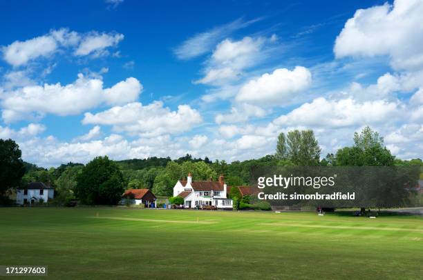 village green cricket - surrey england stock pictures, royalty-free photos & images