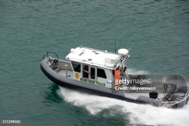miami-dade police boat on patrol - dade police department stock pictures, royalty-free photos & images