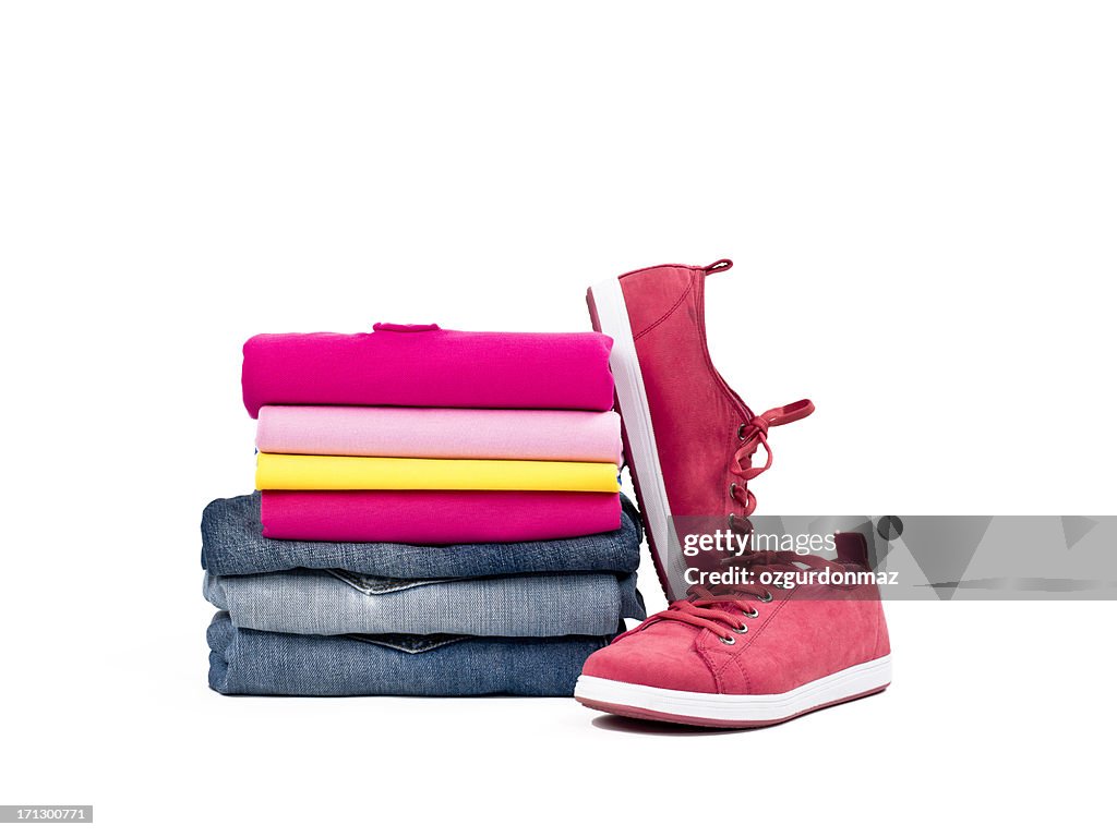 Casual clothes folded in pile on white