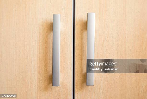 cabinet door - handle stock pictures, royalty-free photos & images