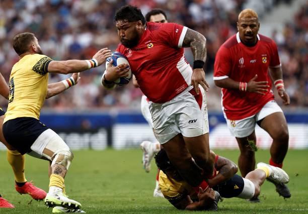 Tonga's tighthead prop Ben Tameifuna is tackled during the France 2023 Rugby World Cup Pool B match between Tonga and Romania at the Stade...