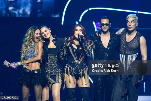 Anahí, Maite Perroni, Dulce Maria, Christopher von Uckermann, and Christian Chavez of RBD perform in concert during the "Soy Rebelde Tour" at Moody...