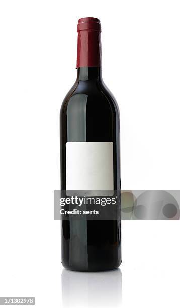 red wine bottle - bordeaux bottle stock pictures, royalty-free photos & images