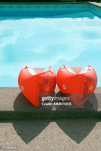 water wings - arm band stock pictures, royalty-free photos & images