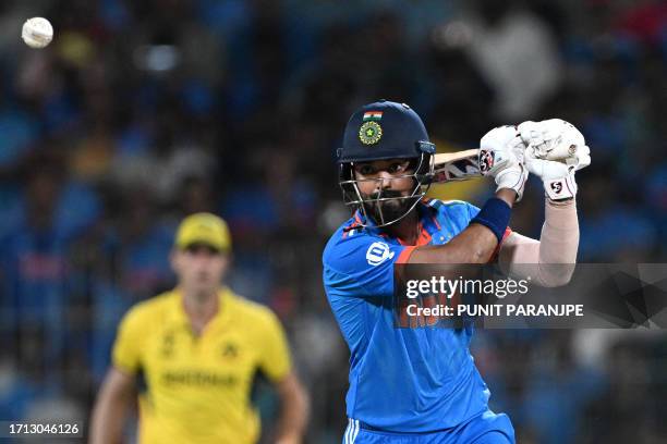 India's KL Rahul watches the ball after playing a shot during the 2023 ICC Men's Cricket World Cup one-day international match between India and...