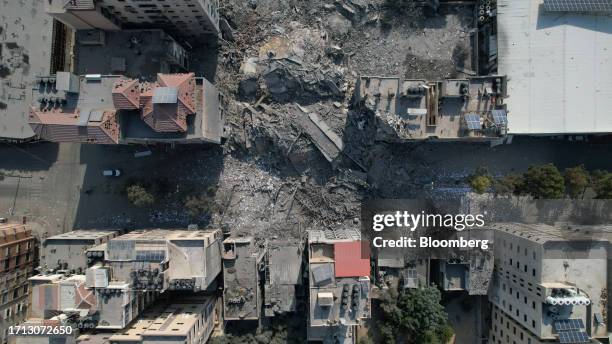 Dstroyed buildings and residential towers following an Israeli missile attack in the Rimal district of Gaza City, Gaza, on Sunday, Oct. 8. 2023....