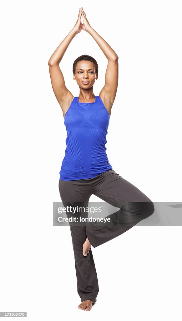 African American Woman Standing In a Yoga Position - Isolated