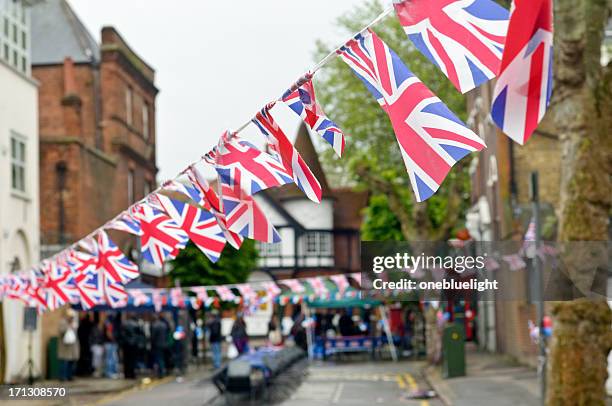 plastic union jack flag bunting - street party uk stock pictures, royalty-free photos & images