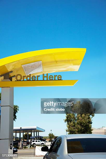 drive thru order here - drive thru order stock pictures, royalty-free photos & images