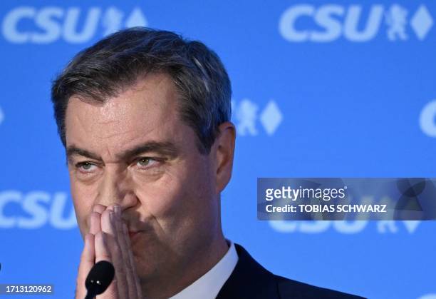Bavaria's State Premier and top candidate of the conservative Christian Social Union party Markus Soeder reacts at the Bavarian State Parliament in...