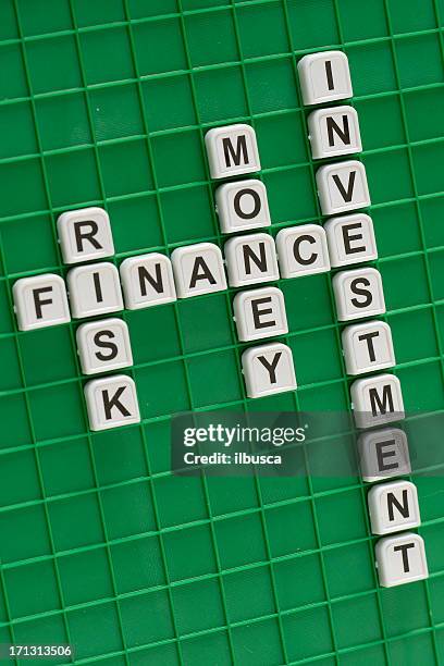 crosswords concept: finance - word game stock pictures, royalty-free photos & images