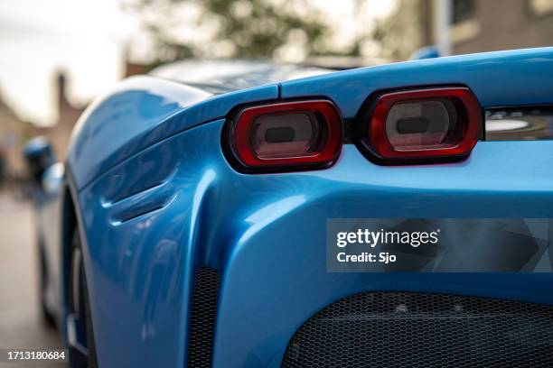 ferrari sf90 sports car rear lights detail - supercars stock pictures, royalty-free photos & images