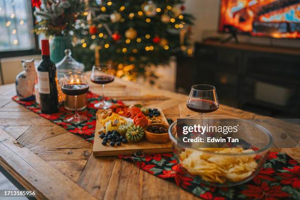 christmas day appetizer plate cheese board food and drink in living room - appetizers imagens e fotografias de stock
