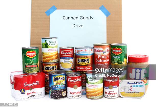 canned goods food drive - canned food drive stock pictures, royalty-free photos & images