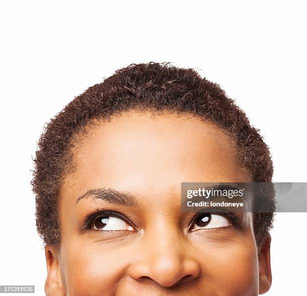アフリカ系アメリカ人女性を見上げる-絶縁型 - at a glance ストックフォトと画像