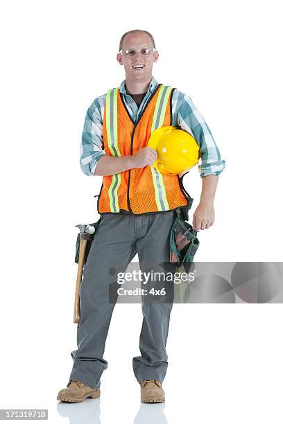 manual worker smiling - builder standing isolated stock pictures, royalty-free photos & images