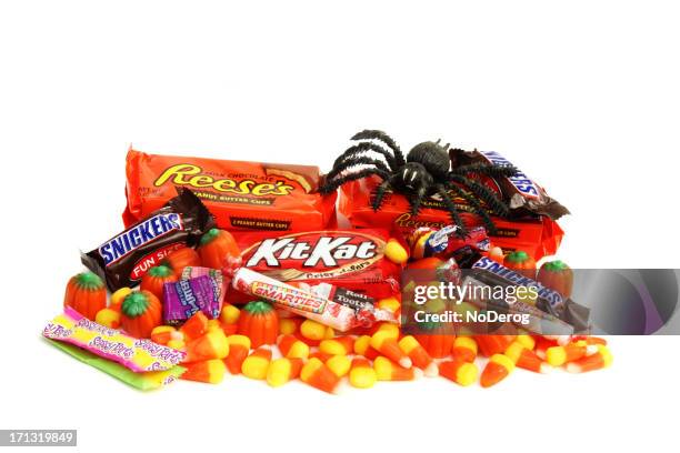 halloween trick or treat candies - arachnid stockfoto's en -beelden