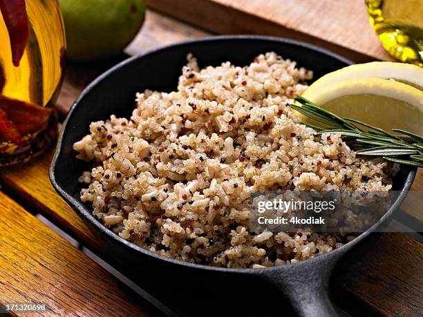 quinoa - brown rice stock pictures, royalty-free photos & images