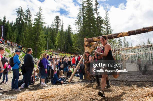 tough mudder - race unity stock pictures, royalty-free photos & images