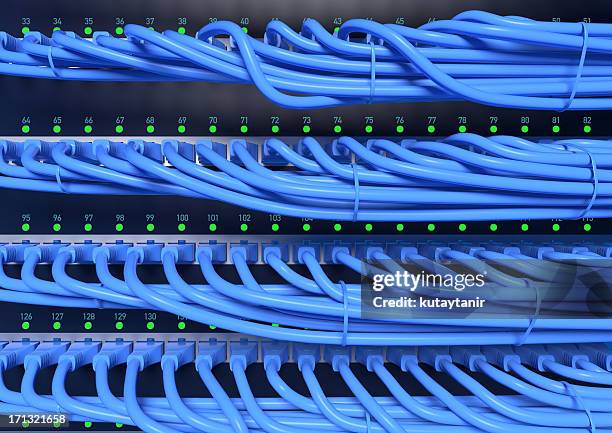 network cables and hub - computer cable stock pictures, royalty-free photos & images