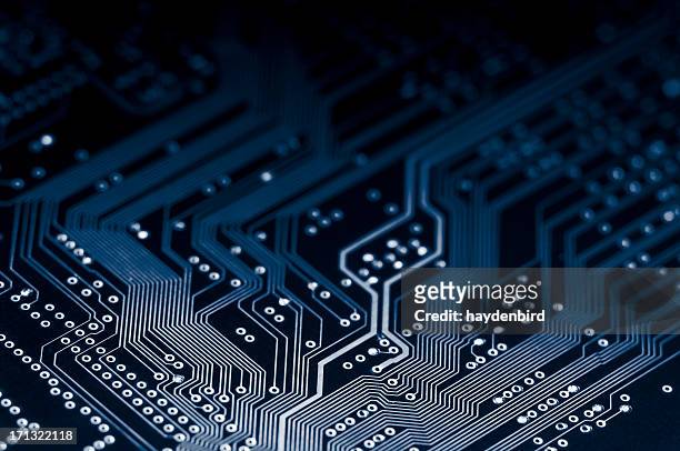 macro shot of electronic circuit board representing modern technology - printplaat stockfoto's en -beelden