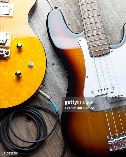 two guitars - bass guitarist stock pictures, royalty-free photos & images