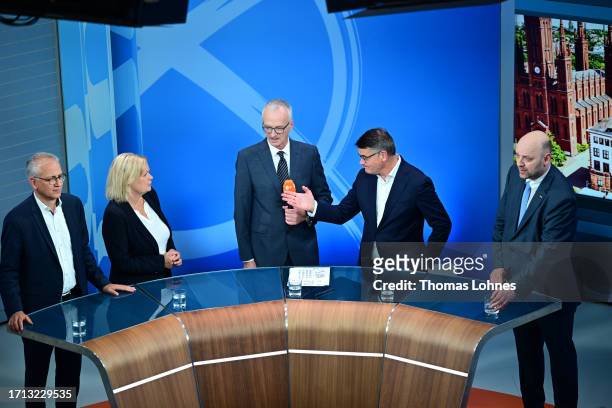 Tarek Al-Wazir co-lead candidate of the Greens Party, Nancy Faeser, lead candidate of the German Social Democrats , Boris Rhein lead candidate of the...