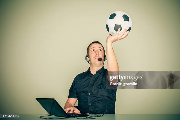 Proud man, professional sport commentator having online TV stream, broadcasting football match isolated over stadium background Stock Photo - Alamy