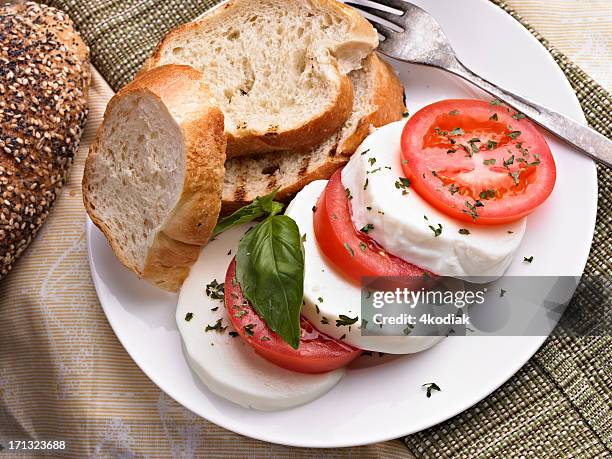 tomato and mozarella - mozzarella stock pictures, royalty-free photos & images
