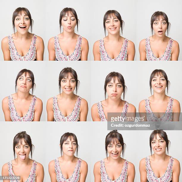 real jovem mulher fazendo expressões faciais - react imagens e fotografias de stock