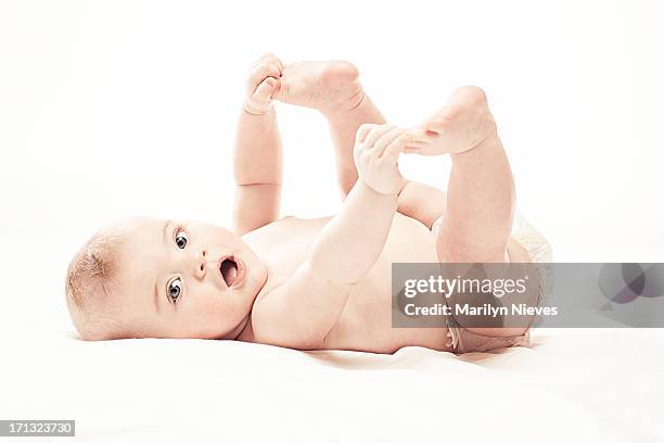 happy baby yoga - baby body stock pictures, royalty-free photos & images