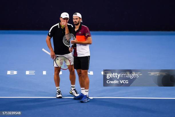 Hugo Nys of Monaco and Jan Zielinski of Poland react in the Men's Doubles Quarter-final match against Wesley Koolhof of Netherlands and Neal Skupski...