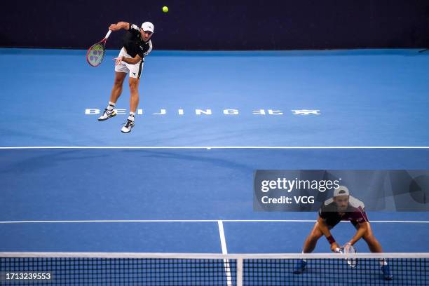 Hugo Nys of Monaco and Jan Zielinski of Poland serve in the Men's Doubles Quarter-final match against Wesley Koolhof of Netherlands and Neal Skupski...