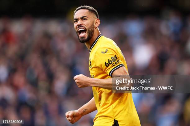 Matheus Cunha of Wolverhampton Wanderers celebrates after assisting his team's second goal scored by Hee-chan Hwang during the Premier League match...