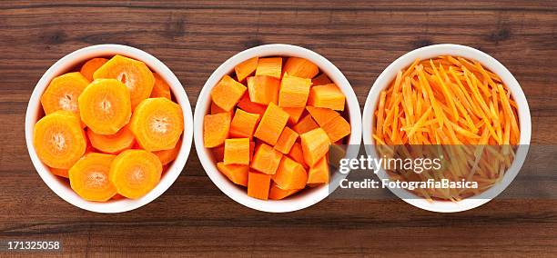 carrot in bowls - chopped food stock pictures, royalty-free photos & images